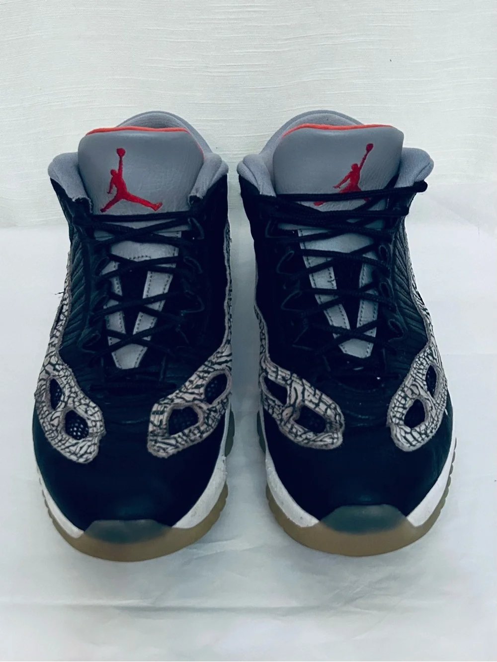 Air Jordan 11 Retro Low IE‎ Men's Black/Grey Sneakers with Red Jumpman Accents